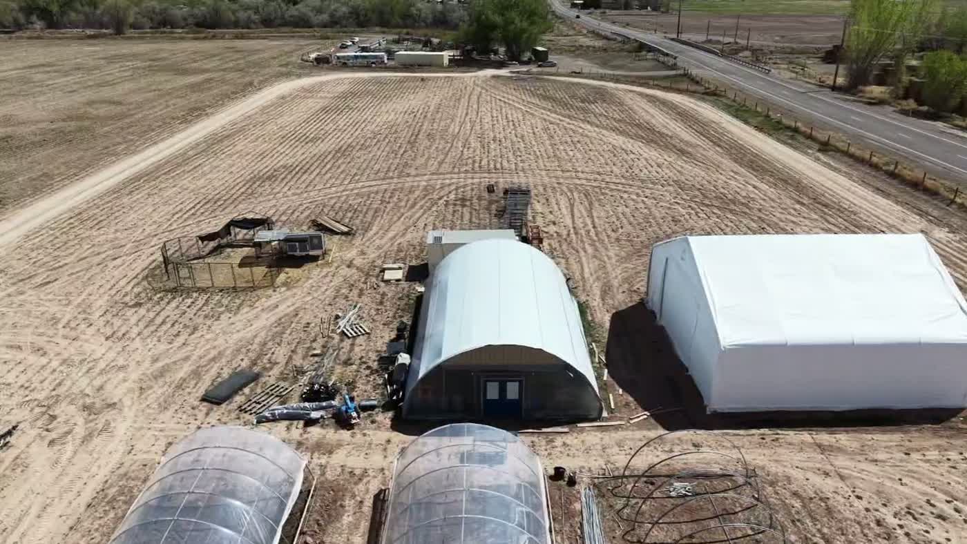 Looking across the SUS Farms fields and greenhouses from above