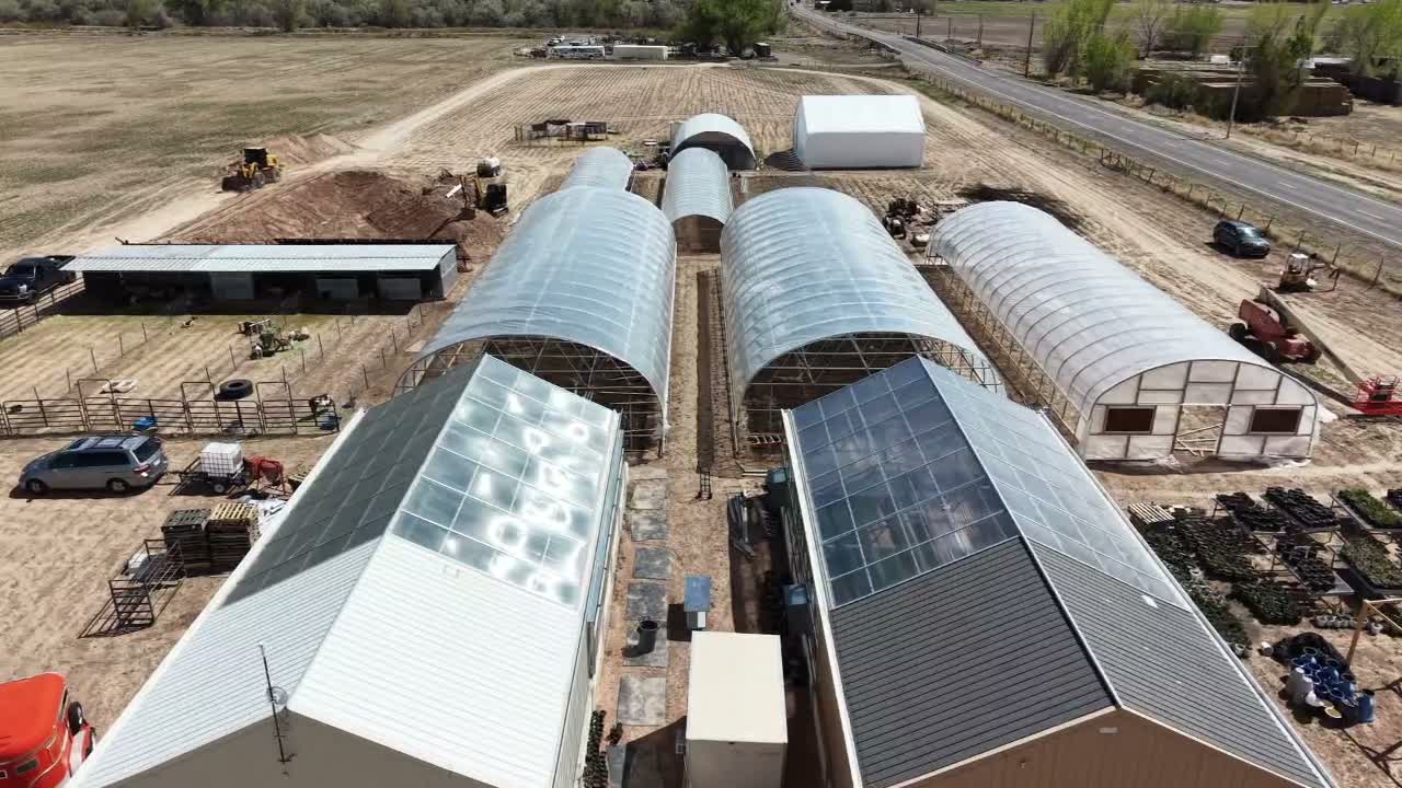 Aerial view of the farm fields and red dirt